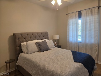 Beautiful lake & golf course VIEW is included with this SOCIAL on Legends Golf and Country Club in Florida - for sale on GolfHomes.com, golf home, golf lot