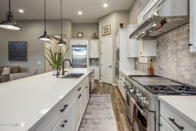 Enjoy sophisticated lock-n-leave living in this impeccably on Whisper Rock Golf Club  in Arizona - for sale on GolfHomes.com, golf home, golf lot