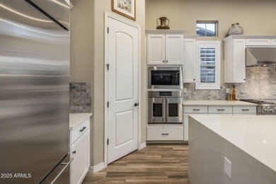 Enjoy sophisticated lock-n-leave living in this impeccably on Whisper Rock Golf Club  in Arizona - for sale on GolfHomes.com, golf home, golf lot