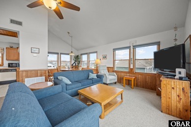 Welcome to 577 Trolling Lane, a charming coastal retreat located on The Currituck Golf Club in North Carolina - for sale on GolfHomes.com, golf home, golf lot