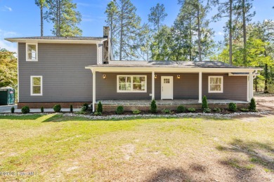Welcome to this beautifully renovated 3-bedroom, 2-bath home in on Seven Lakes Country Club in North Carolina - for sale on GolfHomes.com, golf home, golf lot