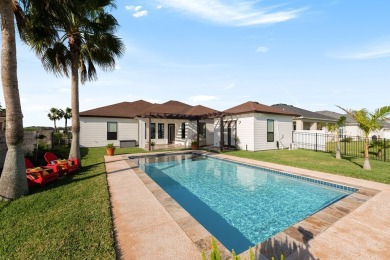 This stunning residence, nestled in the heart of Laguna Vista in on South Padre Island Golf Club in Texas - for sale on GolfHomes.com, golf home, golf lot