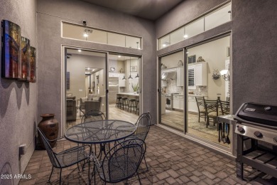 Enjoy sophisticated lock-n-leave living in this impeccably on Whisper Rock Golf Club  in Arizona - for sale on GolfHomes.com, golf home, golf lot