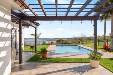 This stunning residence, nestled in the heart of Laguna Vista in on South Padre Island Golf Club in Texas - for sale on GolfHomes.com, golf home, golf lot