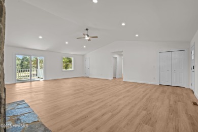Welcome to this beautifully renovated 3-bedroom, 2-bath home in on Seven Lakes Country Club in North Carolina - for sale on GolfHomes.com, golf home, golf lot