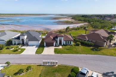 This stunning residence, nestled in the heart of Laguna Vista in on South Padre Island Golf Club in Texas - for sale on GolfHomes.com, golf home, golf lot