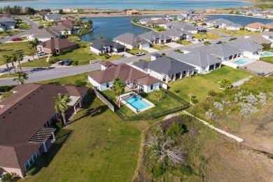 This stunning residence, nestled in the heart of Laguna Vista in on South Padre Island Golf Club in Texas - for sale on GolfHomes.com, golf home, golf lot