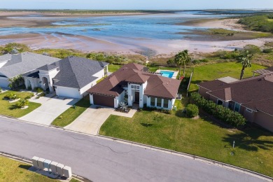 This stunning residence, nestled in the heart of Laguna Vista in on South Padre Island Golf Club in Texas - for sale on GolfHomes.com, golf home, golf lot