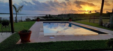 This stunning residence, nestled in the heart of Laguna Vista in on South Padre Island Golf Club in Texas - for sale on GolfHomes.com, golf home, golf lot