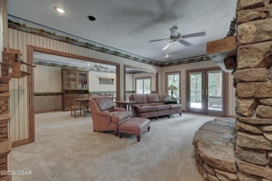 Welcome home to 2401 Sandstone Way! Located in desired Loma on The Bald Eagle Course At Eagle Creek Golf Club in Missouri - for sale on GolfHomes.com, golf home, golf lot