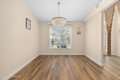 Beautiful Palm Coast Home! Spacious 3 bed, 2 bath home with 2 on The Grand Club - Pine Lakes Course in Florida - for sale on GolfHomes.com, golf home, golf lot