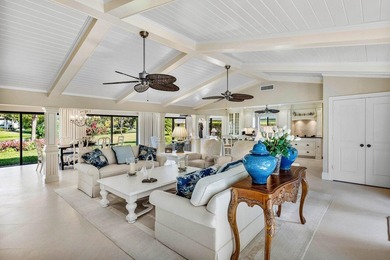 Experience refined lakefront living in this 3-bedroom, 2-bath on Quail Ridge Golf Course and Country Club in Florida - for sale on GolfHomes.com, golf home, golf lot