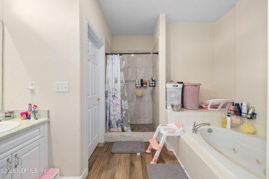 Beautiful Palm Coast Home! Spacious 3 bed, 2 bath home with 2 on The Grand Club - Pine Lakes Course in Florida - for sale on GolfHomes.com, golf home, golf lot