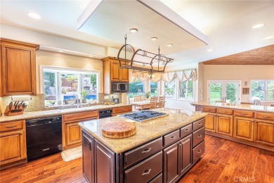 Welcome to this exceptional estate in the heart of Valencia--an on Vista Valencia Golf Course in California - for sale on GolfHomes.com, golf home, golf lot