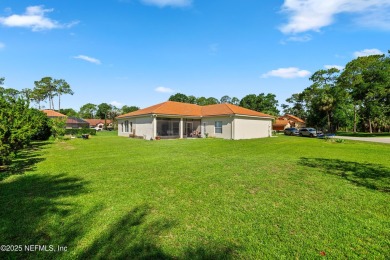 Beautiful Palm Coast Home! Spacious 3 bed, 2 bath home with 2 on The Grand Club - Pine Lakes Course in Florida - for sale on GolfHomes.com, golf home, golf lot