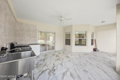 Beautiful Palm Coast Home! Spacious 3 bed, 2 bath home with 2 on The Grand Club - Pine Lakes Course in Florida - for sale on GolfHomes.com, golf home, golf lot