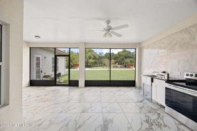 Beautiful Palm Coast Home! Spacious 3 bed, 2 bath home with 2 on The Grand Club - Pine Lakes Course in Florida - for sale on GolfHomes.com, golf home, golf lot
