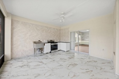 Beautiful Palm Coast Home! Spacious 3 bed, 2 bath home with 2 on The Grand Club - Pine Lakes Course in Florida - for sale on GolfHomes.com, golf home, golf lot
