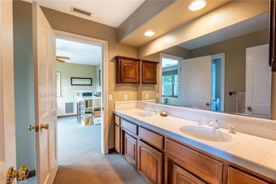 Welcome to this exceptional estate in the heart of Valencia--an on Vista Valencia Golf Course in California - for sale on GolfHomes.com, golf home, golf lot