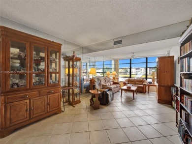 This 2 bedroom 2 bathroom waterfront condo on the 2nd floor on Pine Island Ridge Country Club in Florida - for sale on GolfHomes.com, golf home, golf lot