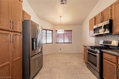 Check out the curb appeal on this FANTASTIC single story in on Painted Desert Golf Club in Nevada - for sale on GolfHomes.com, golf home, golf lot