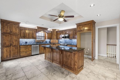 Welcome to 115 Ironwood, a beautifully maintained 5-bedroom, 3 on Island Green Golf Club in Missouri - for sale on GolfHomes.com, golf home, golf lot