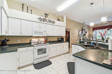 Custom Kent Calais Model in Maintained Friendly Village on Heritage Pines Country Club in Florida - for sale on GolfHomes.com, golf home, golf lot