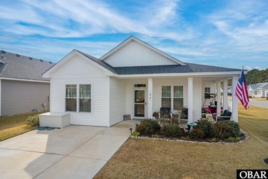 Welcome to 107 Transom Drive! This delightful cottage offers on The Carolina Club in North Carolina - for sale on GolfHomes.com, golf home, golf lot