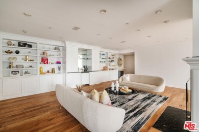 Experience luxury living at its finest in this stunning on Los Angeles Country Club in California - for sale on GolfHomes.com, golf home, golf lot