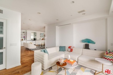 Experience luxury living at its finest in this stunning on Los Angeles Country Club in California - for sale on GolfHomes.com, golf home, golf lot