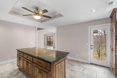 Welcome to 115 Ironwood, a beautifully maintained 5-bedroom, 3 on Island Green Golf Club in Missouri - for sale on GolfHomes.com, golf home, golf lot