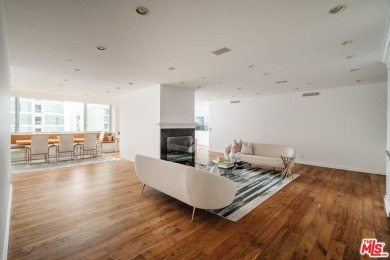 Experience luxury living at its finest in this stunning on Los Angeles Country Club in California - for sale on GolfHomes.com, golf home, golf lot