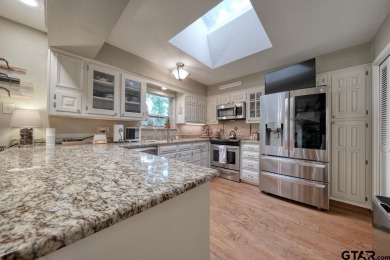 Nestled directly on the scenic Golf Course in Hideaway, this on Hide-A-Way Lake Golf Course in Texas - for sale on GolfHomes.com, golf home, golf lot