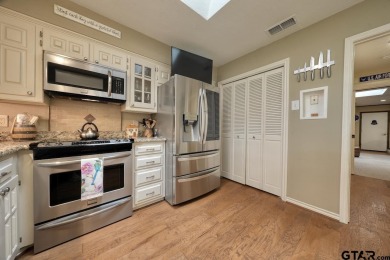 Nestled directly on the scenic Golf Course in Hideaway, this on Hide-A-Way Lake Golf Course in Texas - for sale on GolfHomes.com, golf home, golf lot