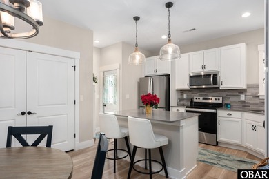 Welcome to 107 Transom Drive! This delightful cottage offers on The Carolina Club in North Carolina - for sale on GolfHomes.com, golf home, golf lot