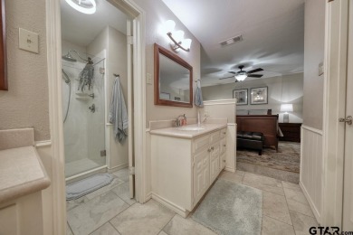 Nestled directly on the scenic Golf Course in Hideaway, this on Hide-A-Way Lake Golf Course in Texas - for sale on GolfHomes.com, golf home, golf lot