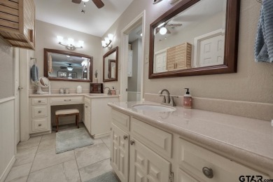 Nestled directly on the scenic Golf Course in Hideaway, this on Hide-A-Way Lake Golf Course in Texas - for sale on GolfHomes.com, golf home, golf lot