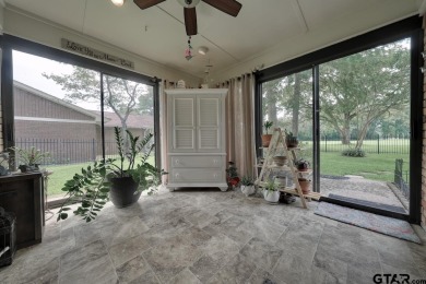 Nestled directly on the scenic Golf Course in Hideaway, this on Hide-A-Way Lake Golf Course in Texas - for sale on GolfHomes.com, golf home, golf lot