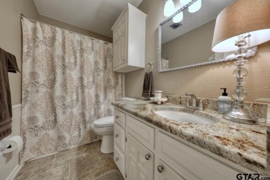 Nestled directly on the scenic Golf Course in Hideaway, this on Hide-A-Way Lake Golf Course in Texas - for sale on GolfHomes.com, golf home, golf lot