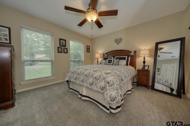 Nestled directly on the scenic Golf Course in Hideaway, this on Hide-A-Way Lake Golf Course in Texas - for sale on GolfHomes.com, golf home, golf lot