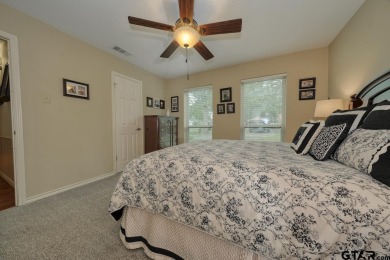 Nestled directly on the scenic Golf Course in Hideaway, this on Hide-A-Way Lake Golf Course in Texas - for sale on GolfHomes.com, golf home, golf lot
