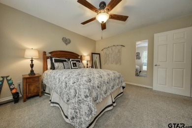 Nestled directly on the scenic Golf Course in Hideaway, this on Hide-A-Way Lake Golf Course in Texas - for sale on GolfHomes.com, golf home, golf lot