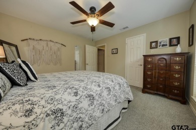Nestled directly on the scenic Golf Course in Hideaway, this on Hide-A-Way Lake Golf Course in Texas - for sale on GolfHomes.com, golf home, golf lot