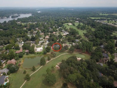 Nestled directly on the scenic Golf Course in Hideaway, this on Hide-A-Way Lake Golf Course in Texas - for sale on GolfHomes.com, golf home, golf lot