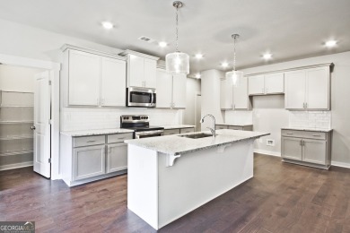 Welcome to 4063 Links Blvd - Built with Heart, Not Just a on Traditions of Braselton Golf Club in Georgia - for sale on GolfHomes.com, golf home, golf lot