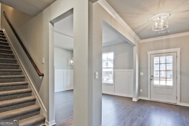 Welcome to 4063 Links Blvd - Built with Heart, Not Just a on Traditions of Braselton Golf Club in Georgia - for sale on GolfHomes.com, golf home, golf lot