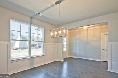 Welcome to 4063 Links Blvd - Built with Heart, Not Just a on Traditions of Braselton Golf Club in Georgia - for sale on GolfHomes.com, golf home, golf lot