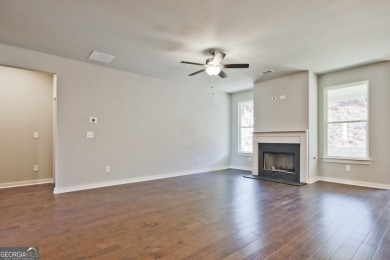 Welcome to 4063 Links Blvd - Built with Heart, Not Just a on Traditions of Braselton Golf Club in Georgia - for sale on GolfHomes.com, golf home, golf lot