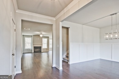 Welcome to 4063 Links Blvd - Built with Heart, Not Just a on Traditions of Braselton Golf Club in Georgia - for sale on GolfHomes.com, golf home, golf lot