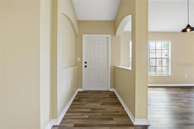 One or more photo(s) has been virtually staged. Well maintained on The Links of Lake Bernadette in Florida - for sale on GolfHomes.com, golf home, golf lot